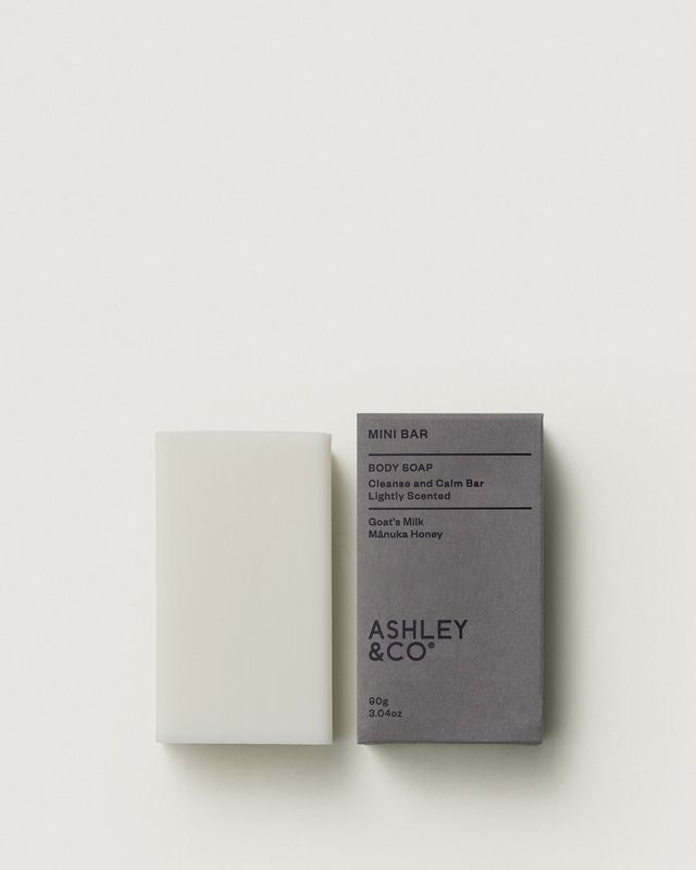 Ashley & Co Mini Bar 90g soap with grey packaging and the unwrapped bar