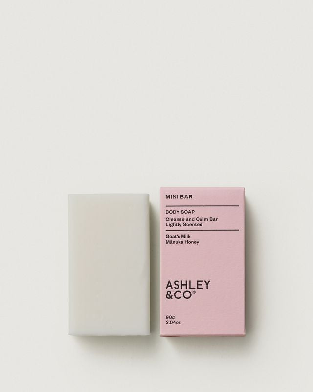Ashley & Co Mini Bar 90g soap with pink packaging and the unwrapped bar
