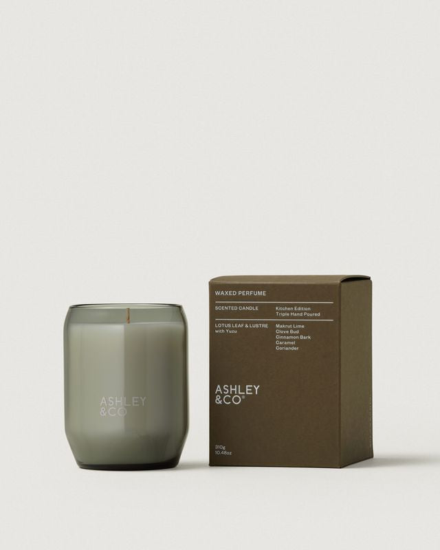 Ashley & Co Waxed Perfume Kitchen Edition candle in Lotus Leaf & Lustre with yuzu, smoky glass jar and brown box